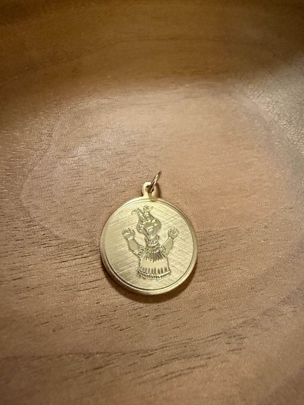 Gold Women's Charm Pendant with Embossed Figure